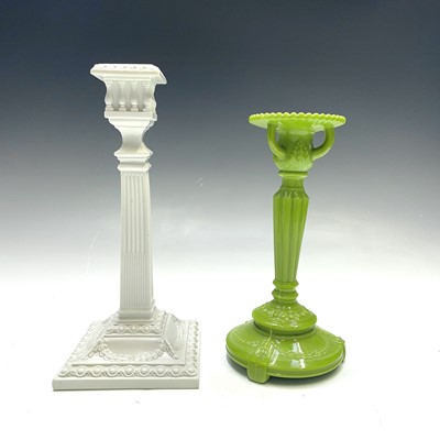 Lot 925 - A Sowerby glass aesthetic green candle holder...