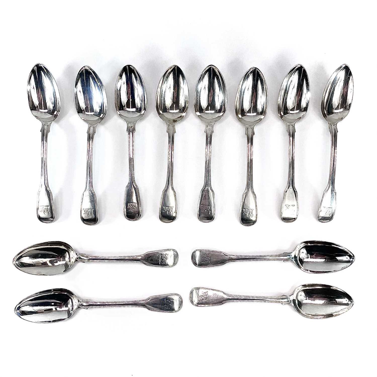 Lot 34 - A good set of eleven George III silver fiddle...