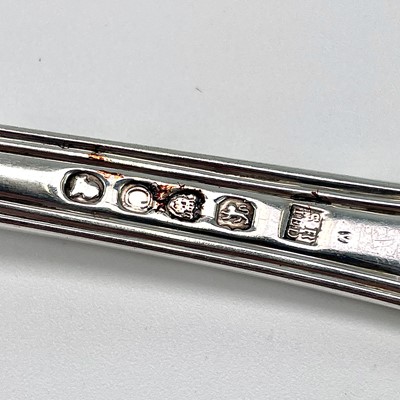 Lot 34 - A good set of eleven George III silver fiddle...