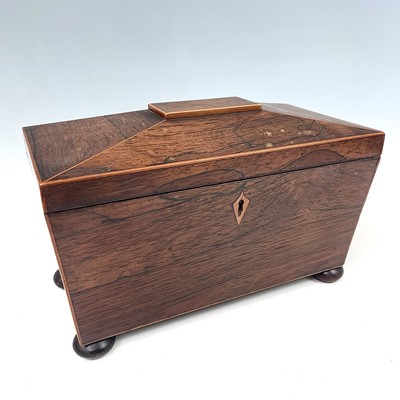 Lot 164 - An early Victorian rosewood sarcophagus shape...