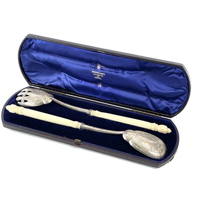 Lot 31 - A cased pair of Victorian silver serving...