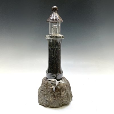 Lot 84 - A Cornish serpentine lighthouse table lamp,...