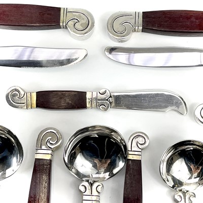 Lot 17 - A good Mexican silver and wood Aztec design...