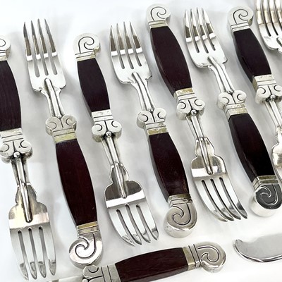 Lot 17 - A good Mexican silver and wood Aztec design...