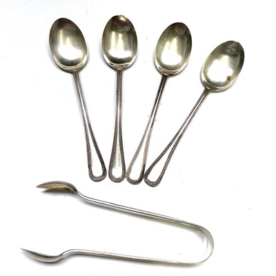 Lot 43 - A George V silver set of four tea spoons by...