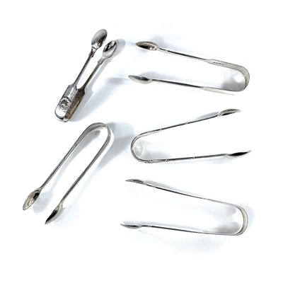 Lot 176 - Five various Victorian silver sugar nips, the...