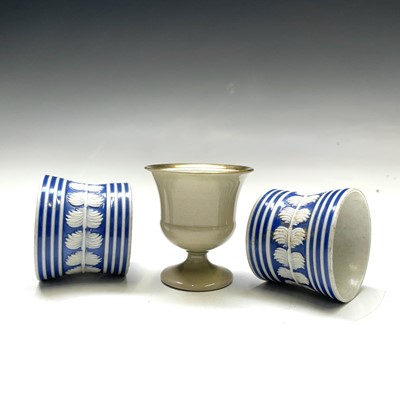 Lot 817 - A Wedgwood gilded drab ware egg cup, circa...