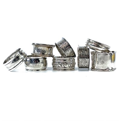 Lot 186 - A collection of eight silver hallmarked napkin...