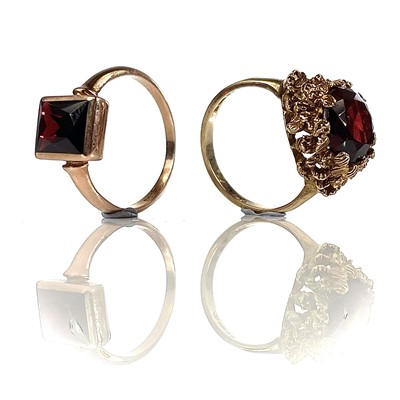 Lot 6 - Two 9ct garnet set rings, one hallmarked...