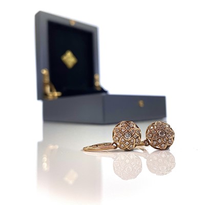 Lot 394 - A pair 18ct gold and diamond set earrings designed by Kat Florence.