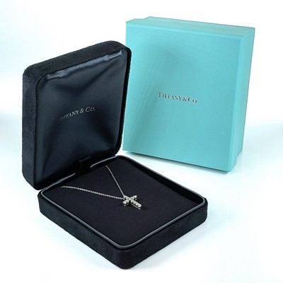 Lot 319 - A Tiffany & Co platinum and diamond set cross...