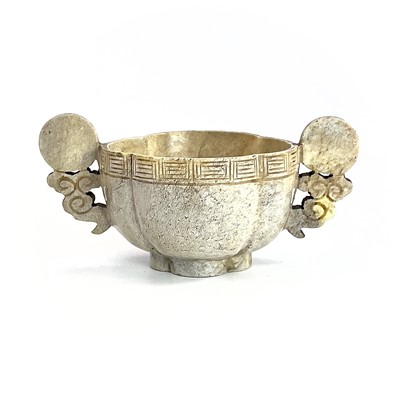 Lot 281 - A Chinese hardstone twin-handled bowl, height...