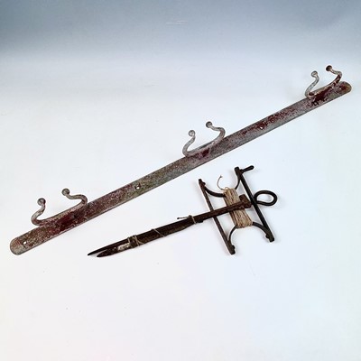 Lot 104 - A wrought iron garden string line and winder,...