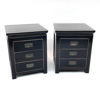 Lot 3045 - A pair of OKA black lacquered bedside chests,...