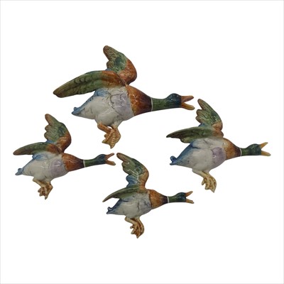 Lot 1342 - A graduated set of four Royal Dux flying...