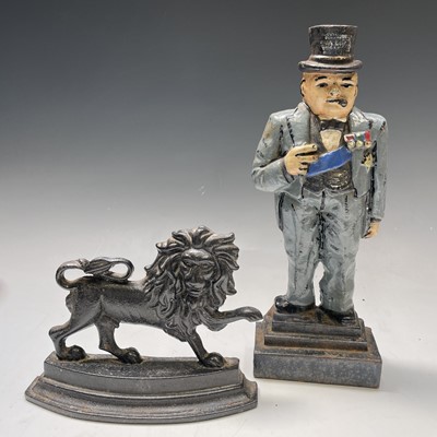 Lot 184 - A heavy cast iron painted doorstop of...