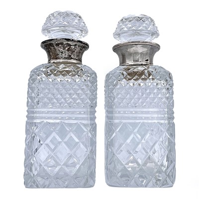 Lot 52 - A pair of modern cut glass whisky decanters...