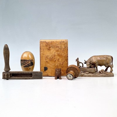 Lot 33 - A Continental linden wood carving of a cow at...