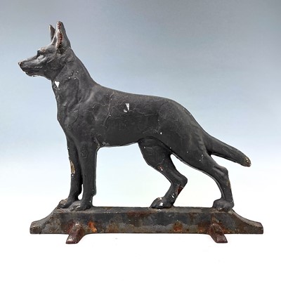 Lot 198 - A cast iron door stop modelled as an Alsatian,...