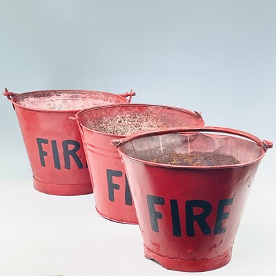 Lot 215 - Three red painted 'FIRE' buckets, height 24cm.