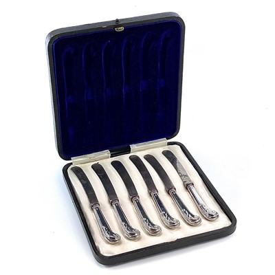 Lot 56 - A George V silver cased set of leaf scroll...