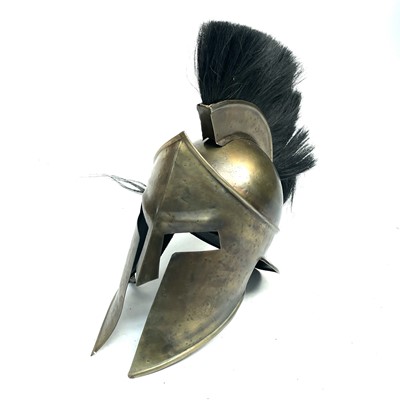 Lot 217 - A reproduction brass Corinthian type helmet...