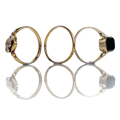 Lot 117 - A 22ct gold band ring, 1.2g, together with an...
