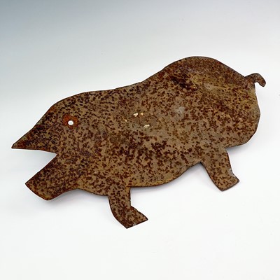 Lot 222 - A sheet metal silhouette of a pig, 45cm x 25cm.