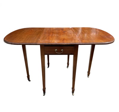 Lot 3102 - A George III style mahogany drop leaf dining...