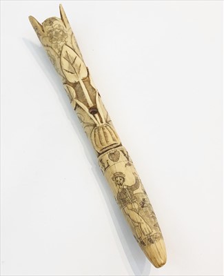 Lot 480 - A scrimshaw walrus tusk, finely decorated with...
