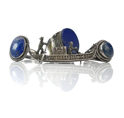 Lot 258 - A Persian silver and gilt filigree Lapis...