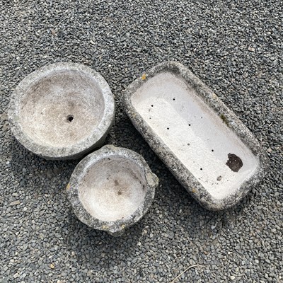 Lot 620 - A reconstituted stone mortar shape planter...