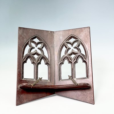 Lot 106 - A walnut table music stand with gothic arch...