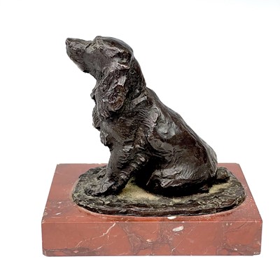 Lot 174 - A French bronze figure of a seated cocker...
