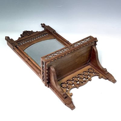 Lot 232 - An early 20th century oak fretwork hanging...