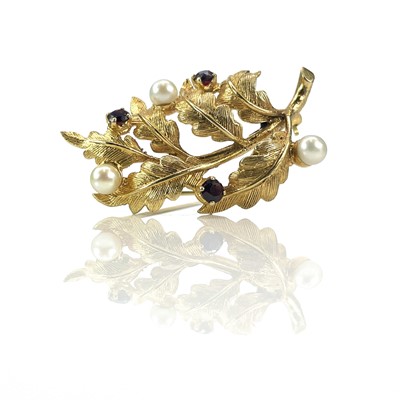 Lot 215 - A 1960's leaf form brooch set with three...