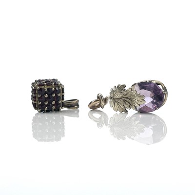 Lot 161 - A 9ct gold garnet set cube pendant, length...