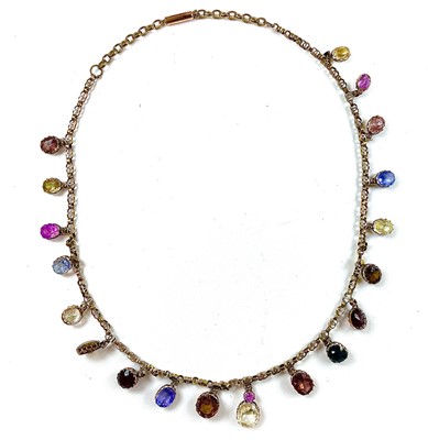 Lot 58 - A gold multiple specimen gem set necklace, the...