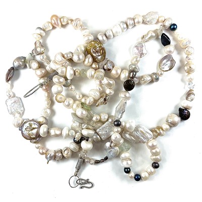 Lot 259 - A contemporary four strand irregular blister...