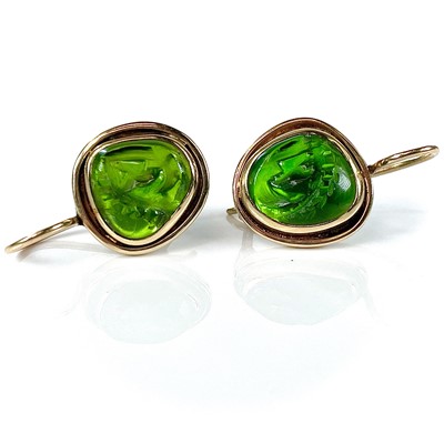 Lot 113 - A pair of gold and carved green stone earrings,...