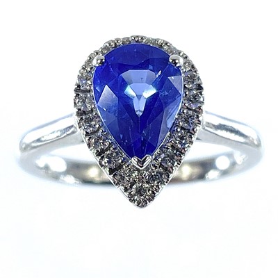 Lot 43 - An 18ct white gold cornflower blue sapphire...