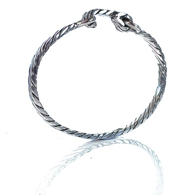 Lot 285 - A 999 fine silver Newlyn Rope bangle by James...