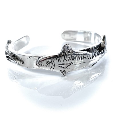 Lot 237a - A 999 fine silver Newlyn Trio bangle by James Suddaby.