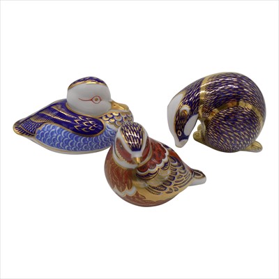 Lot 1339 - Three Royal Crown Derby paperweights - badger,...