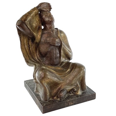 Lot 307 - A carved wood figure of a seated Buddhist,...