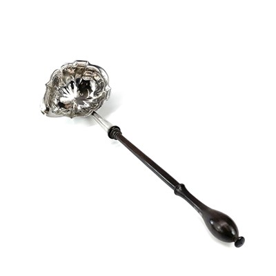 Lot 88 - A George II silver punch ladle, possibly by...