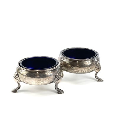 Lot 136 - A pair of George II silver salts raised on...