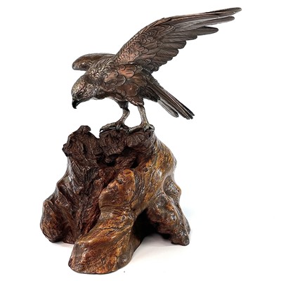 Lot 24 - A Japanese silvered bronze Okimono of a hawk...