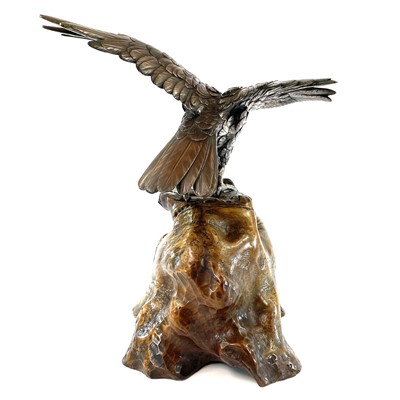 Lot 24 - A Japanese silvered bronze Okimono of a hawk...