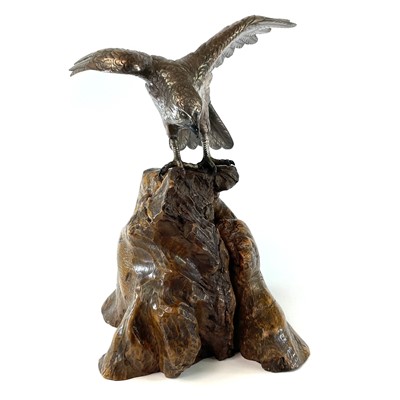 Lot 24 - A Japanese silvered bronze Okimono of a hawk...